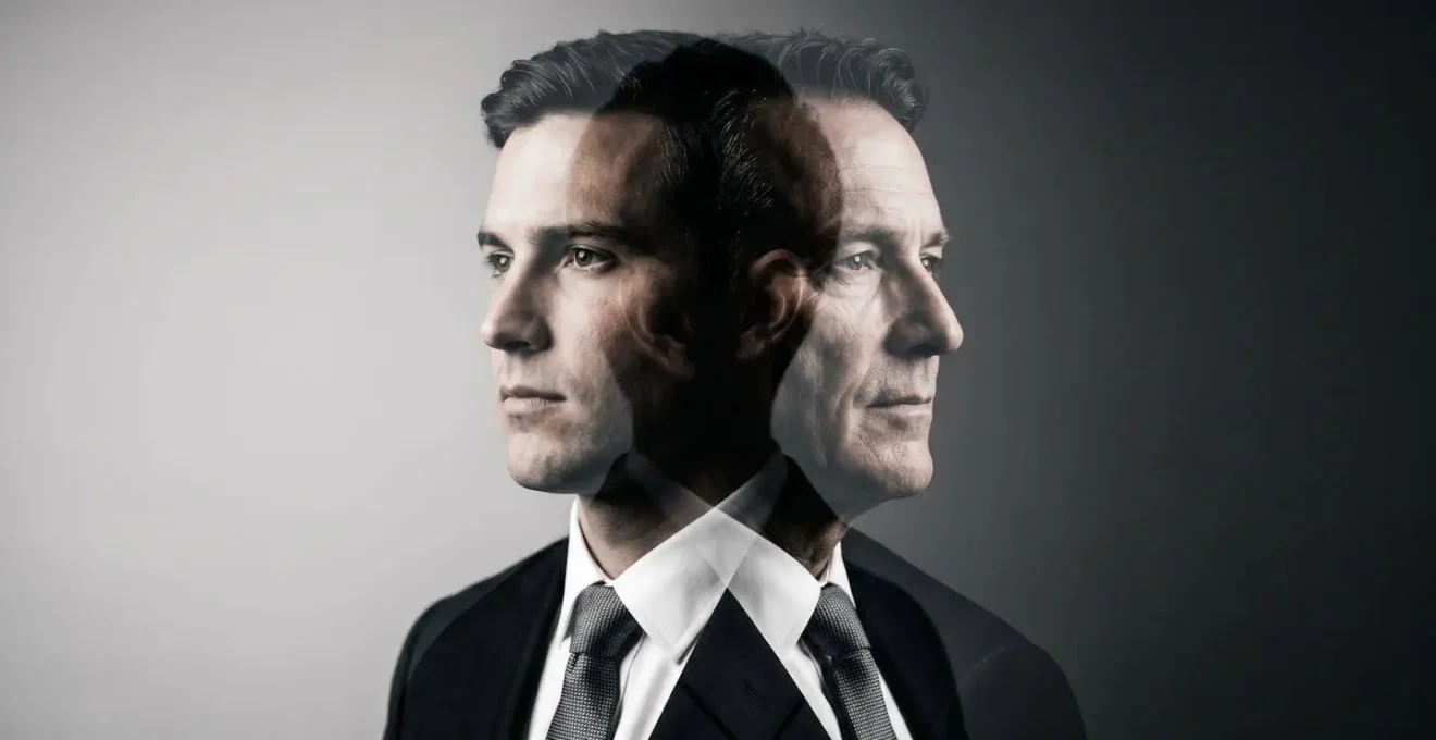 Close-up portrait showing overlapping silhouettes of two business leaders representing generational transition